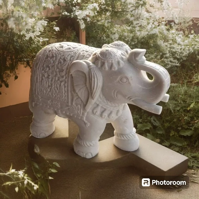 Royal carved elephant statue in white marble